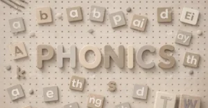 Phonics learning tiles showing letter sounds and combinations arranged around the word “Phonics” on a neutral background.